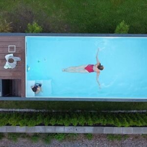 Piscina modular de 6,2 m x 2,5 m con sistema de natación a contracorriente, zona deportiva y spa.